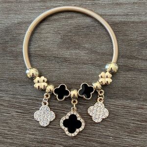 Stylish Gold and Black Clover Bracelet